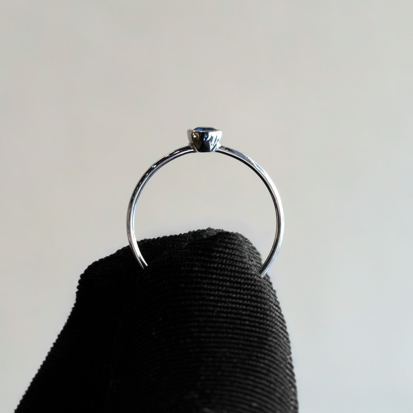 Product Name: 14kt White Gold Round Sapphire Bezel-Set Delicate Stacking Ring