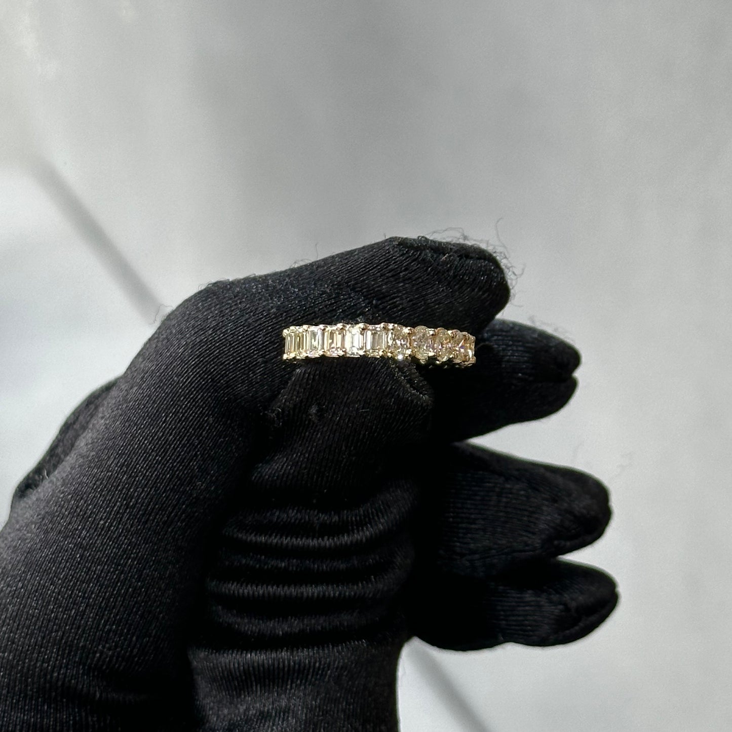 Yellow Gold Emerald and Oval Diamond Eternity Band