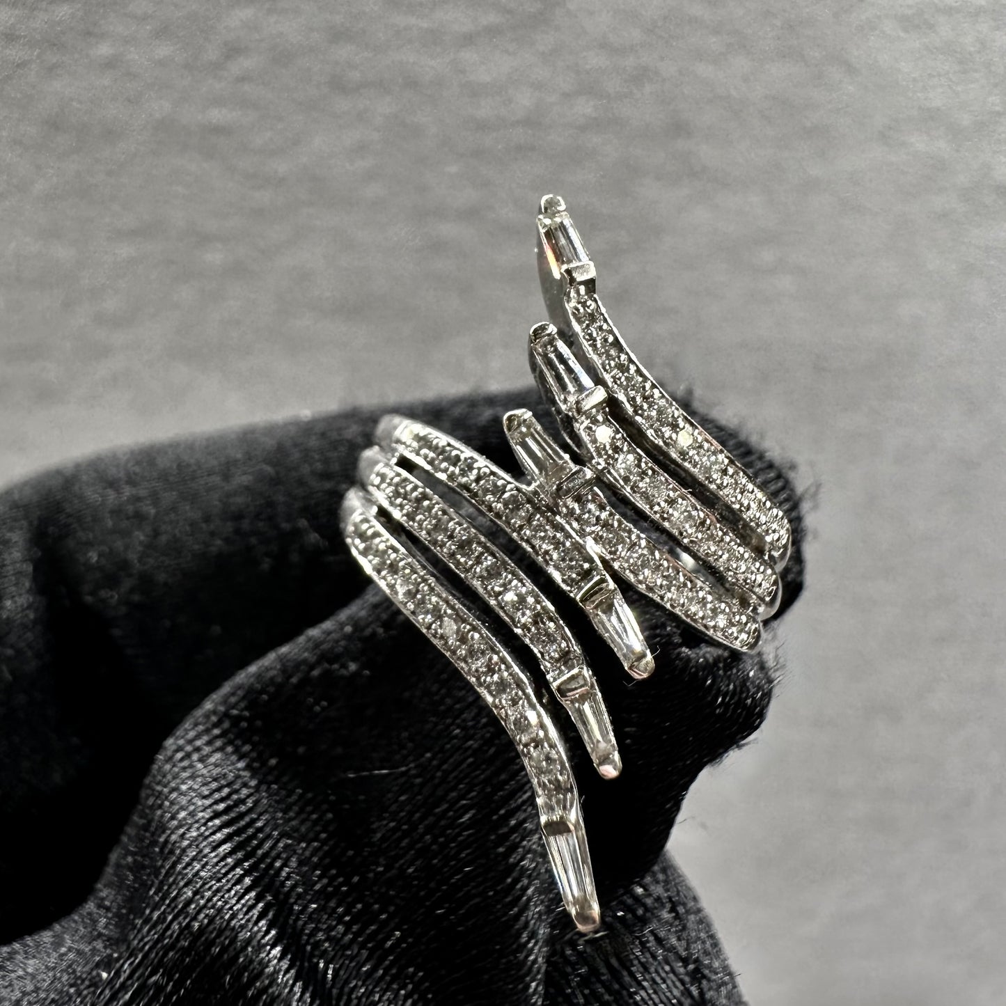 18KT White Gold Tapered Baguette and Round Diamond Ring