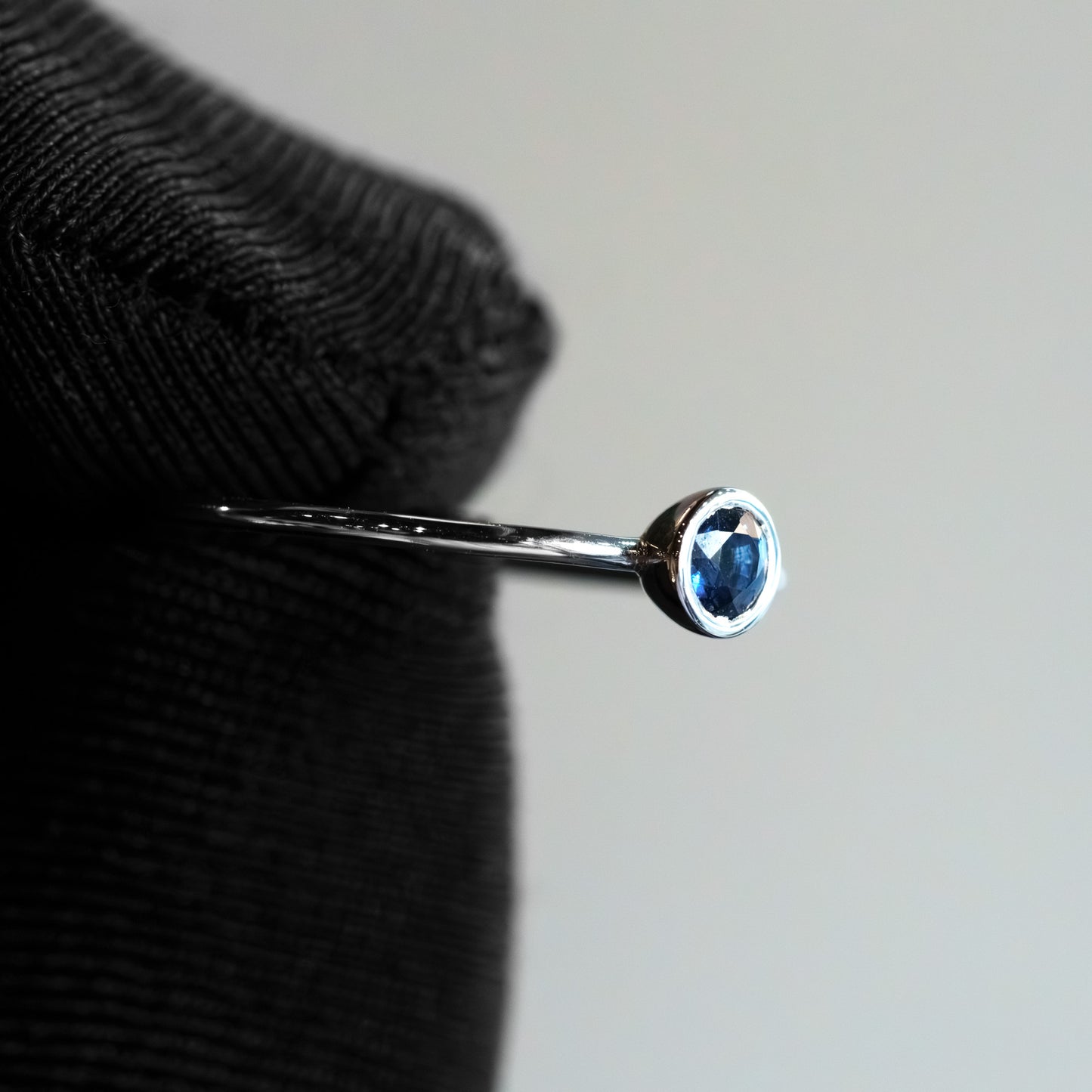 Product Name: 14kt White Gold Round Sapphire Bezel-Set Delicate Stacking Ring