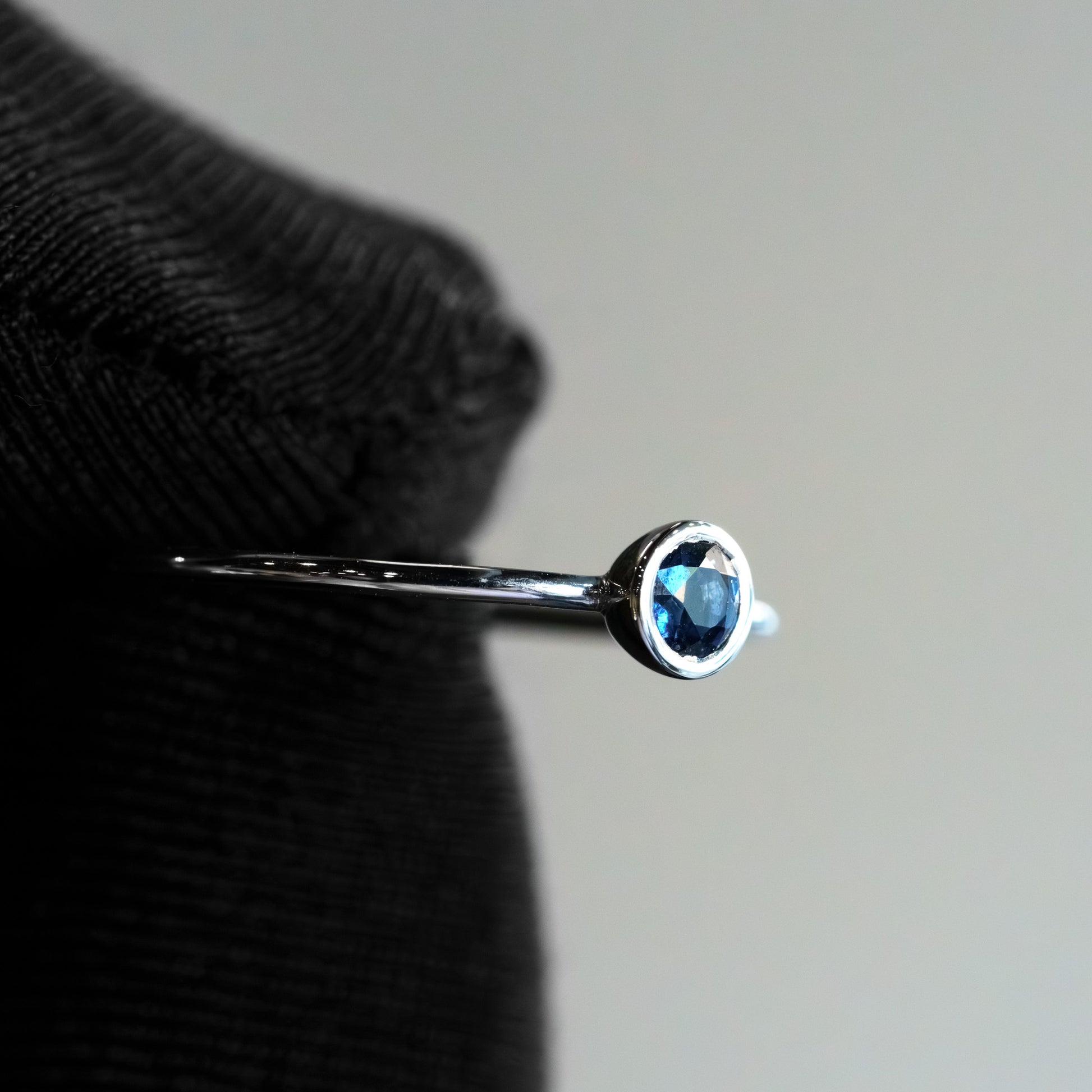 Product Name: 14kt White Gold Round Sapphire Bezel-Set Delicate Stacking Ring