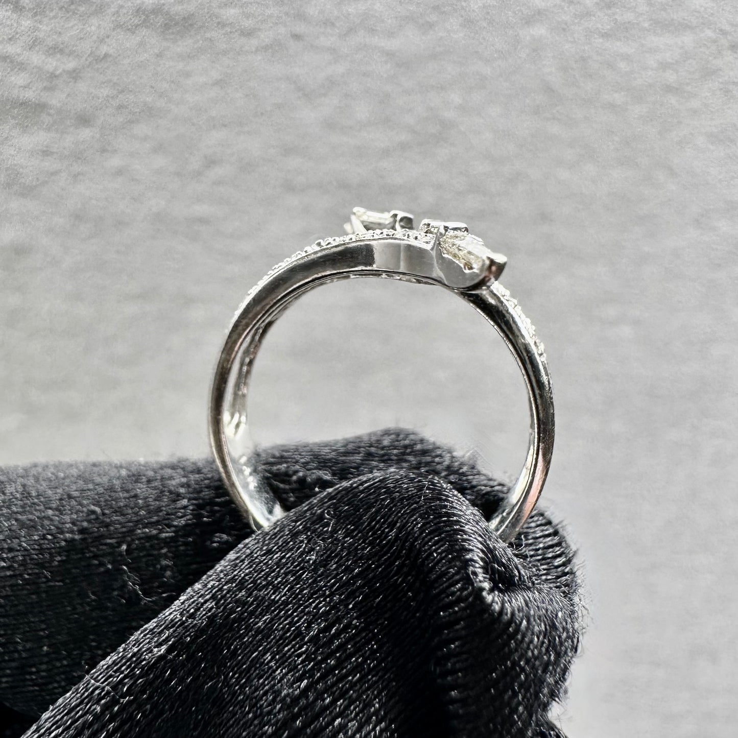 18KT White Gold Tapered Baguette and Round Diamond Ring